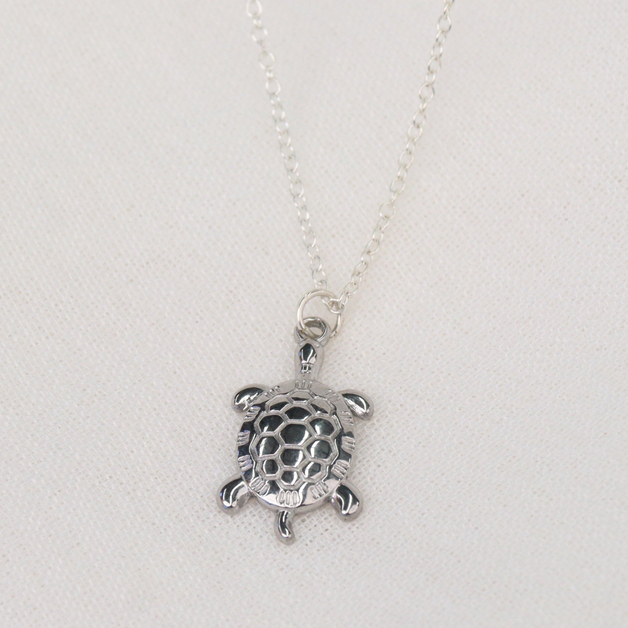 SS/18KGP Turtle shops pendants